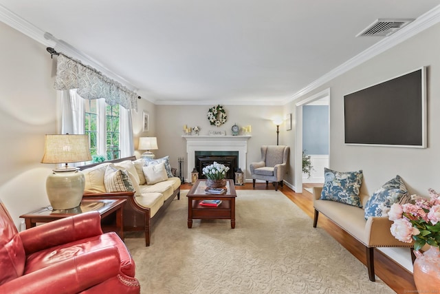 17 Stockade Rd, Simsbury, CT 06092 - living room with a fireplace, crown molding, and wood finished floors