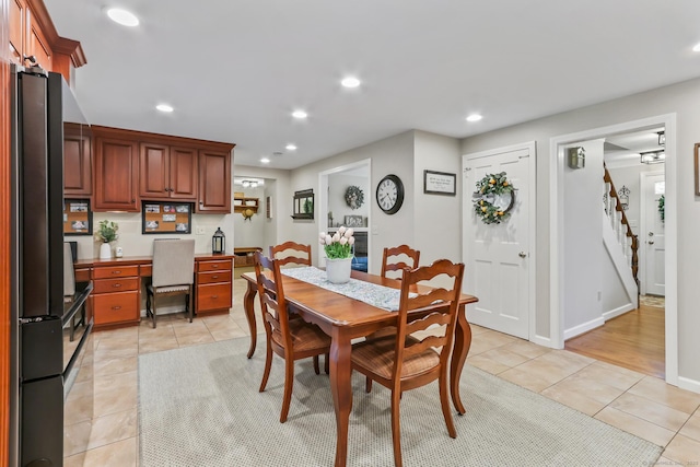 17 Stockade Rd, Simsbury, CT 06092 - dining area featuring light tile patterned floors, recessed lighting, stairway, a desk, and baseboards