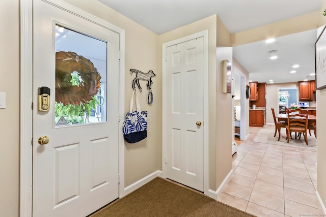 17 Stockade Rd, Simsbury, CT 06092 - entrance foyer with baseboards, light tile patterned floors, and recessed lighting