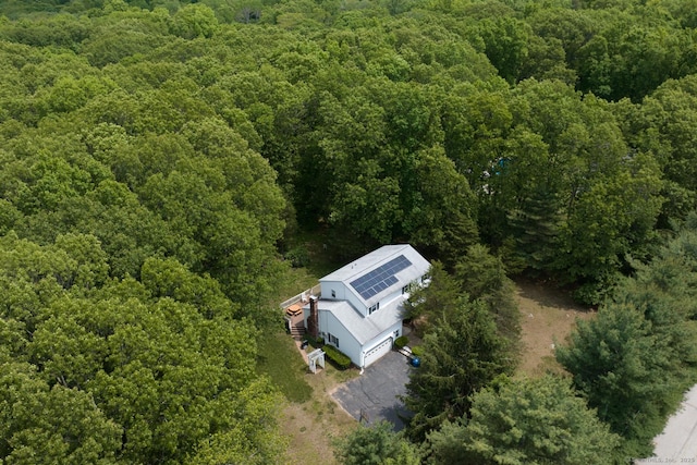 24 Marbella Ln, Tolland, CT 06084 - view from above of property with a forest