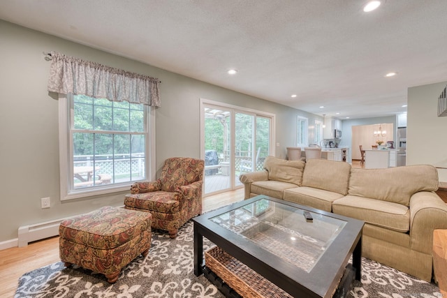 24 Marbella Ln, Tolland, CT 06084 - living room featuring wood finished floors, recessed lighting, and baseboards