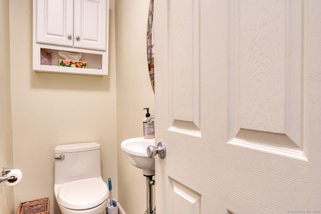 24 Marbella Ln, Tolland, CT 06084 - half bathroom with toilet and baseboards