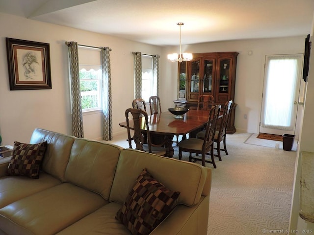 2 Abbewood Dr Unit 2, Enfield, CT 06082 - dining space with a chandelier and light carpet