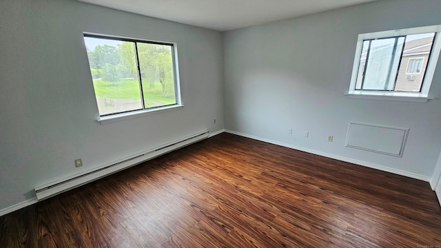 31 Regis Dr Unit 31, Meriden, CT 06450 - unfurnished room with baseboard heating, dark wood-type flooring, and baseboards