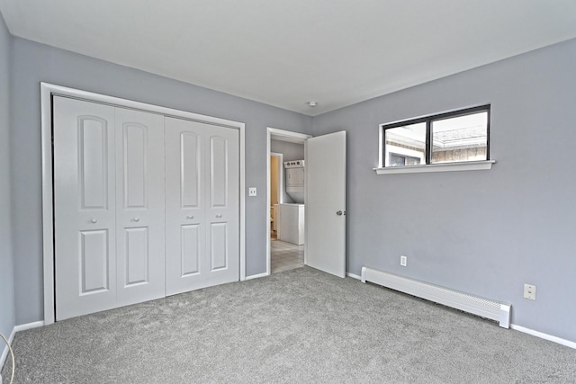 60 Plainfield Ave Unit 14, West Haven, CT 06516 - unfurnished bedroom featuring a baseboard radiator, carpet floors, a closet, and baseboards