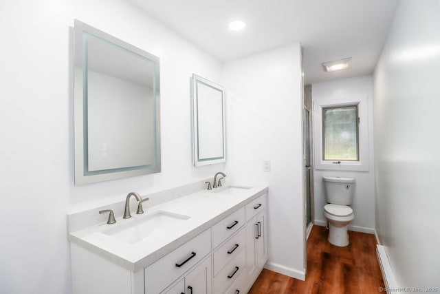 4 Deer Run Trl, Sherman, CT 06784 - full bath featuring double vanity, wood finished floors, a shower stall, toilet, and baseboards