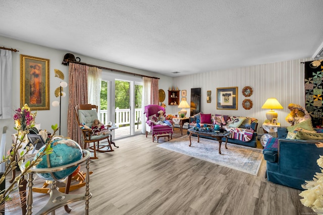 27 N Rd, Waterford, CT 06385 - living room with a textured ceiling and wood finished floors