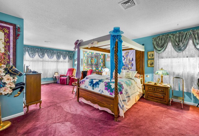 27 N Rd, Waterford, CT 06385 - bedroom with carpet flooring, a textured ceiling, a baseboard radiator, and baseboards