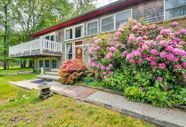 27 N Rd, Waterford, CT 06385 - rear view of property featuring a deck and a lawn