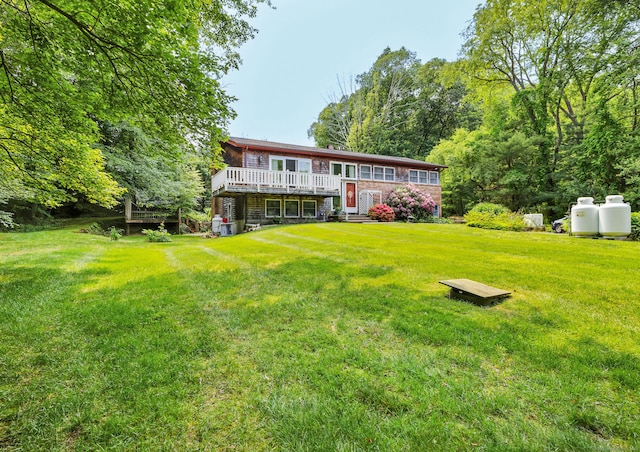 27 N Rd, Waterford, CT 06385 - back of house featuring a deck and a yard