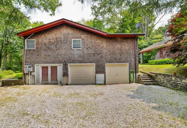 27 N Rd, Waterford, CT 06385 - garage featuring gravel driveway