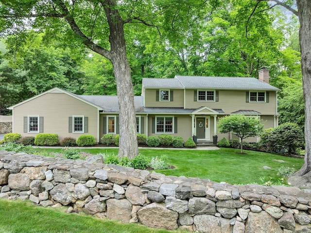 67 Great Hill Rd, Ridgefield, CT 06877 - view of front of house featuring a chimney, a front lawn, and a shingled roof