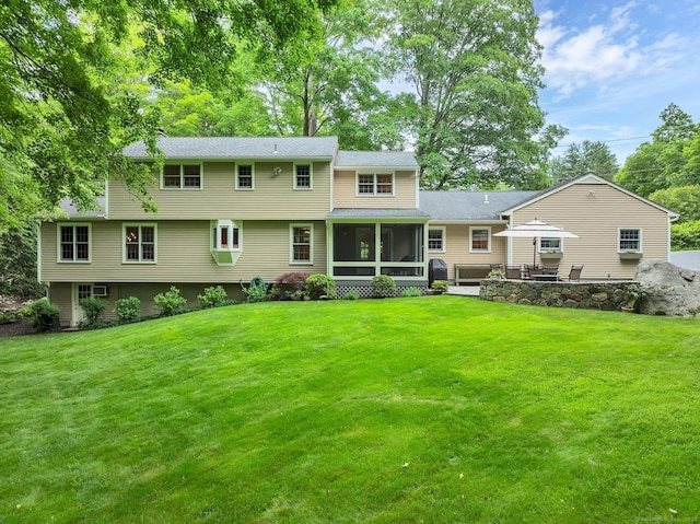 67 Great Hill Rd, Ridgefield, CT 06877 - rear view of property with a sunroom, a yard, a patio, and roof with shingles