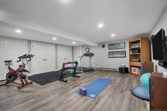 67 Great Hill Rd, Ridgefield, CT 06877 - workout room featuring wood finished floors, recessed lighting, and a baseboard heating unit