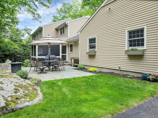 67 Great Hill Rd, Ridgefield, CT 06877 - back of property with a patio and a lawn