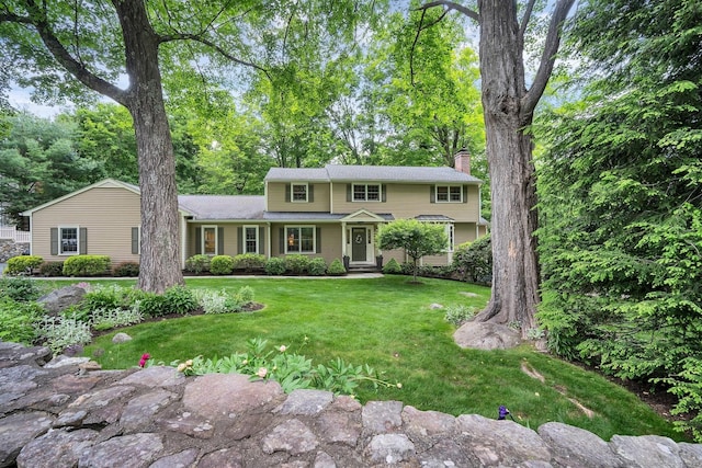 67 Great Hill Rd, Ridgefield, CT 06877 - traditional-style house with a chimney and a front lawn