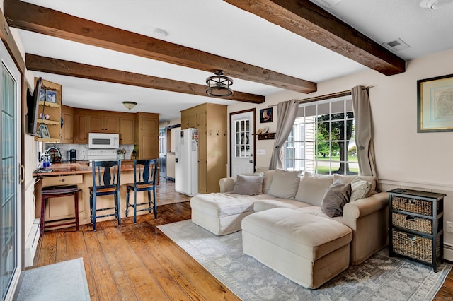 47 Edrow Rd, Bristol, CT 06010 - living room featuring beamed ceiling and light wood-type flooring