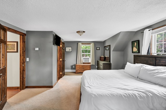 47 Edrow Rd, Bristol, CT 06010 - carpeted bedroom with a textured ceiling, a baseboard radiator, and cooling unit