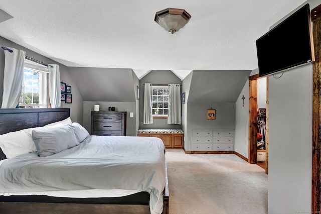 47 Edrow Rd, Bristol, CT 06010 - bedroom featuring vaulted ceiling, light carpet, and a textured ceiling