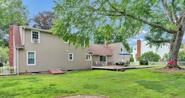 47 Edrow Rd, Bristol, CT 06010 - rear view of property featuring a chimney and a wooden deck