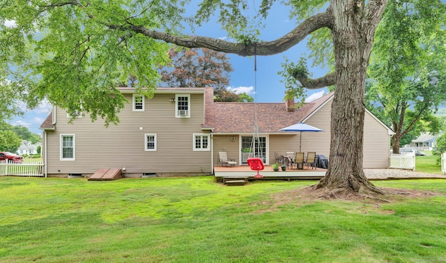 47 Edrow Rd, Bristol, CT 06010 - back of property with a deck, a chimney, and roof with shingles