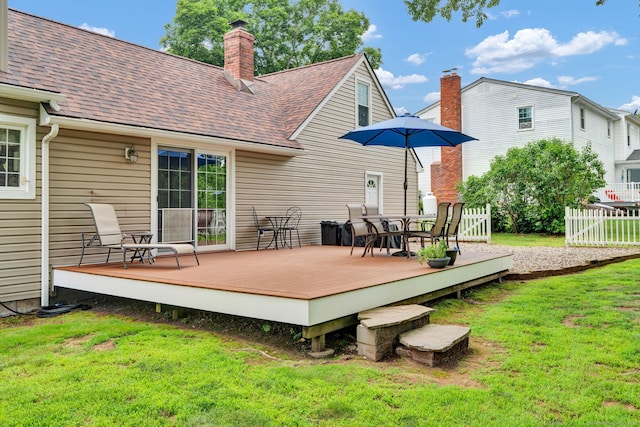 47 Edrow Rd, Bristol, CT 06010 - back of house featuring a shingled roof, a wooden deck, and a chimney