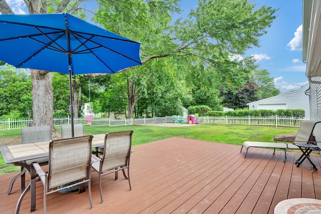47 Edrow Rd, Bristol, CT 06010 - wooden deck with a fenced backyard, outdoor dining area, and view of scattered trees