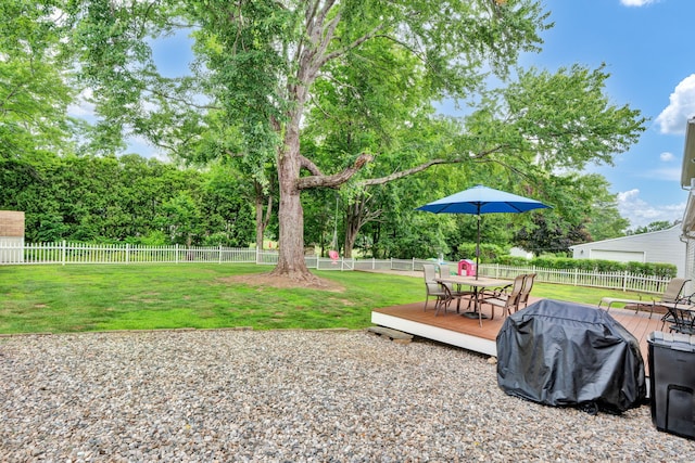 47 Edrow Rd, Bristol, CT 06010 - fenced backyard featuring a deck, outdoor dining space, and view of wooded area