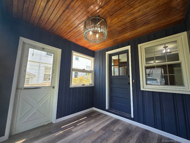 28 S Highland St, West Hartford, CT 06119 - doorway to outside with wood ceiling, a chandelier, baseboards, and dark wood-style floors