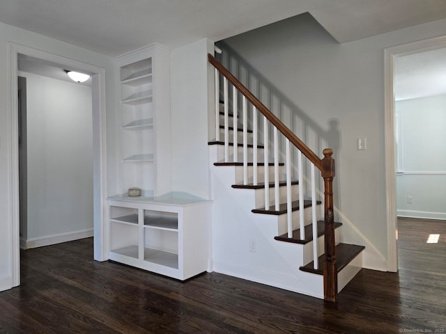 28 S Highland St, West Hartford, CT 06119 - stairs featuring wood finished floors, built in shelves, and baseboards