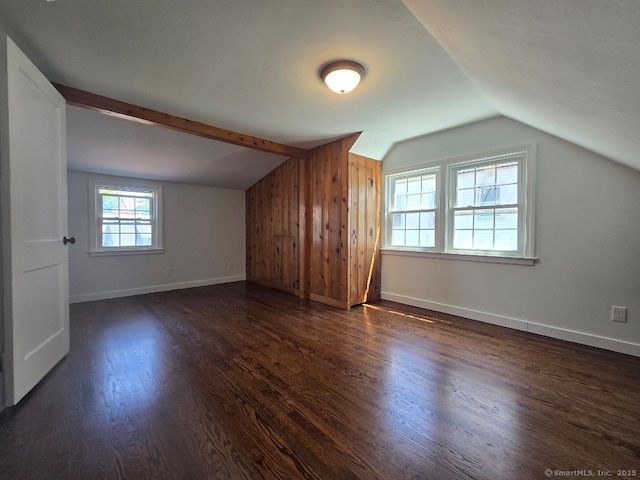 28 S Highland St, West Hartford, CT 06119 - additional living space featuring vaulted ceiling, dark wood-style floors, baseboards, and wooden walls