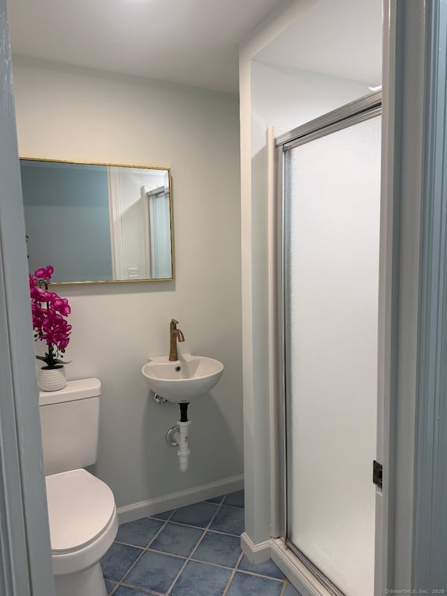 28 S Highland St, West Hartford, CT 06119 - full bathroom featuring a shower stall, toilet, tile patterned flooring, and a sink