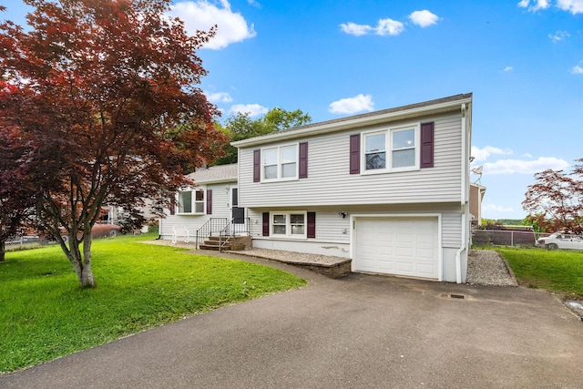 8 Roberta Dr, Middletown, CT 06457 - view of front of house featuring asphalt driveway and an attached garage