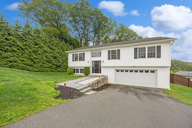 23 Shadybrook Ln, Waterbury, CT 06706 - raised ranch with driveway and a garage