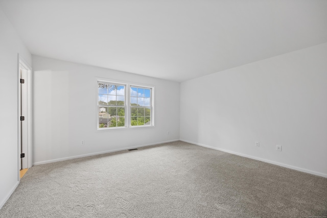 23 Shadybrook Ln, Waterbury, CT 06706 - carpeted empty room with baseboards
