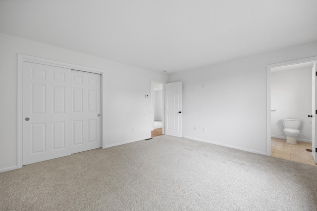 23 Shadybrook Ln, Waterbury, CT 06706 - unfurnished bedroom with carpet flooring, ensuite bath, and a closet