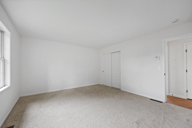 23 Shadybrook Ln, Waterbury, CT 06706 - carpeted empty room with a smoke detector and baseboards