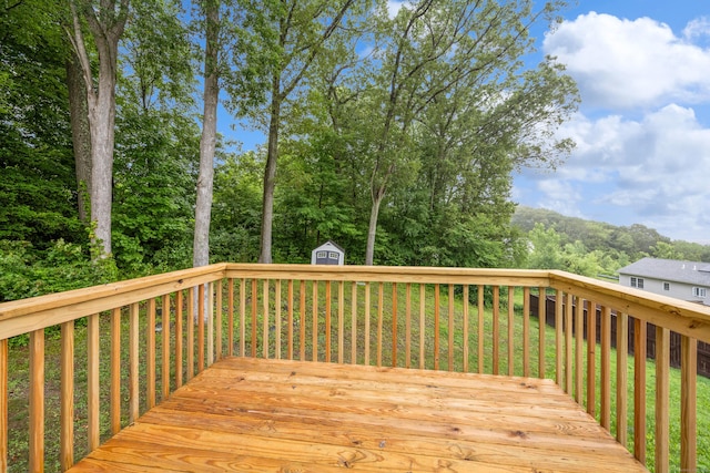 23 Shadybrook Ln, Waterbury, CT 06706 - wooden terrace featuring a storage unit