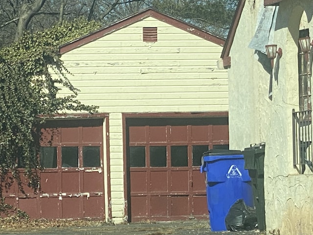 view of property exterior with a garage
