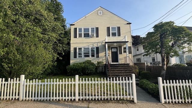 64 Locust St, Bridgeport, CT 06610 - traditional-style house featuring a fenced front yard