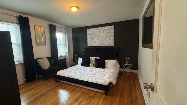 64 Locust St, Bridgeport, CT 06610 - bedroom featuring wood finished floors and baseboards