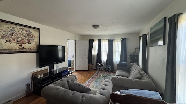 64 Locust St, Bridgeport, CT 06610 - living area featuring wood finished floors and baseboards