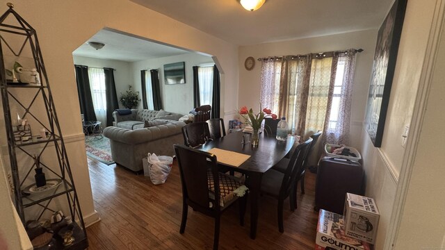 64 Locust St, Bridgeport, CT 06610 - dining room with wood finished floors and arched walkways