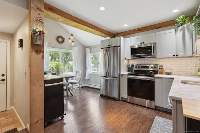 52 Berkshire Dr, Brookfield, CT 06804 - kitchen with stainless steel appliances, light countertops, backsplash, a baseboard heating unit, and recessed lighting