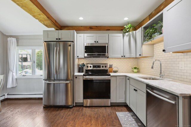 52 Berkshire Dr, Brookfield, CT 06804 - kitchen with stainless steel appliances, a sink, baseboard heating, beamed ceiling, and tasteful backsplash