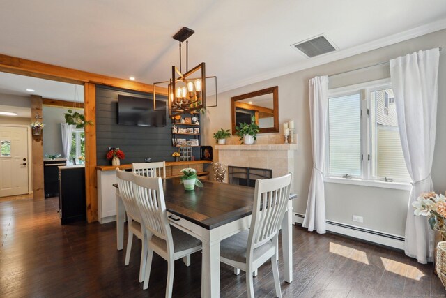 52 Berkshire Dr, Brookfield, CT 06804 - dining room with dark wood finished floors, a chandelier, recessed lighting, crown molding, and a tiled fireplace