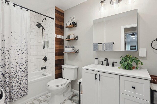 52 Berkshire Dr, Brookfield, CT 06804 - bathroom with vanity, toilet, marble look tiles, shower / bath combo with shower curtain, and baseboards