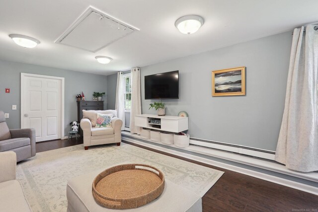 52 Berkshire Dr, Brookfield, CT 06804 - living area with wood finished floors, a baseboard radiator, and baseboards