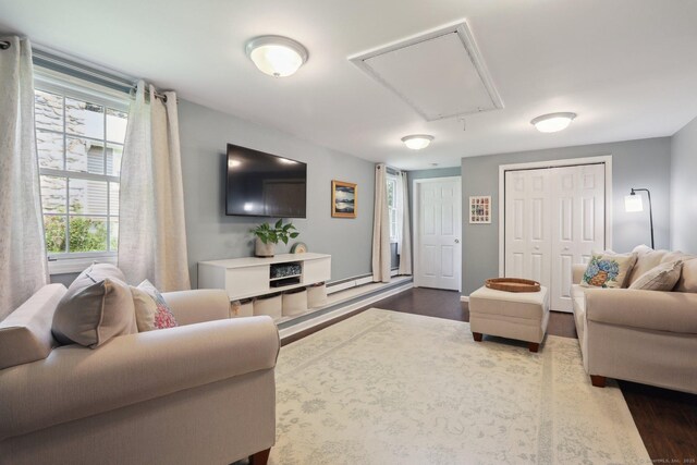 52 Berkshire Dr, Brookfield, CT 06804 - living room with attic access and dark wood-type flooring