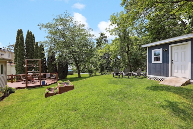 52 Berkshire Dr, Brookfield, CT 06804 - view of green lawn featuring a wooden deck and an outdoor structure